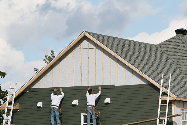 Professional Siding Contractor technician working in Decatur, IN